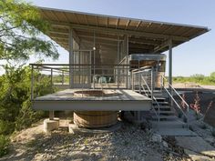 a house that is sitting in the dirt