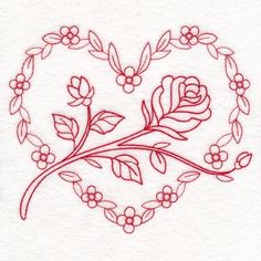 a heart shaped embroidered with flowers and leaves