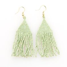 two pairs of green beaded earrings with fringes