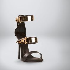 DETAILS AMAL is for the daring and bold, with its edgy design featuring an open toe, rear zipper, and metal buckle. The 11cm heel height is sure to make a statement, while the PU upper, EVA outsole, and PU lining and insole provide comfort and support. Take your style to new heights with AMAL! Open Toe Rear Zipper Metal Buckle Feature Heel Height: Approx.11cm Upper Material: PU Outsole Material: EVA Lining Material: PU Insole Material: PU Luxury Open Toe Heels With Buckle Closure, Luxury Open Toe Heels With Metal Feet, Leather Heels With Metal Pin Buckle For Evening, Modern Heels With Buckle Closure For Night Out, Open Toe Heels With Metal Pin Buckle For Party, Modern Open Toe Heels With Metal Feet, Edgy Formal Heels With Buckle Closure, Edgy Open Toe Heels With Metal Feet, Elegant Open Toe Heels With Metal Pin Buckle