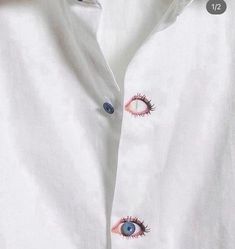 an eye print on a white shirt