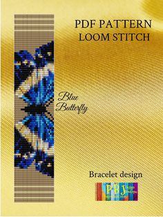 a cross stitch book cover with blue butterflies on the front and bottom, in gold