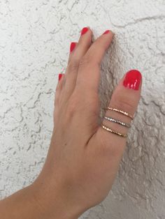 YOu get all Three rings. delicate and beautiful three stacking rings Very feminine and elegant. Wear them all together or separate They look great mixed with other styles of stacking rings too or just by themselves We strive your provide you with a meticulously crafted piece of beautiful jewelry. All of our rings come with a high shine finish and are made with the highest quality of materials. We use the best quality materials. These rings are gold Ion plated and have at least 2.5 microns of gol Rose Gold Stackable Midi Promise Rings, Dainty Stackable Jewelry, Dainty Inelastic Stackable Jewelry, Dainty Hammered Midi Rings For Anniversary, Delicate Stackable Midi Rings For Anniversary, Dainty Hammered Rose Gold Rings, Rose Gold Stackable Open Rings With Diamond Cut, Delicate Rose Gold Stackable Midi Rings, Dainty Hammered Stackable Open Rings