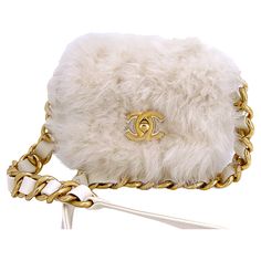 Store item: 67242 We love Chanel White Ivory Fur Mini Crossbody Flap Bag Chunky Chain not only because it's chic and seasonal - but it's environmentally friendly with faux fur. The chunky woven chain strap in brushed gold hardware goes so well with the small frame of the bag, and hugs the bag by wrapping around the side and bottom - and the CC turnlock has the same leather underlay. Red canvas interior and microchip. Featured in Vogue for best "shearling" bags to get in fall 2021. In white/ivory fur and brushed gold hardware. For 20 years, Boutique Patina has specialized in sourcing and curating the most pristine vintage and collectible accessories by searching closets around the world. This item is in excellent condition with very few signs of normal use. Corners are clean with no rubbing Fur Handbags, Faux Fur Bag, Chanel Outfit, Woven Chain, Best Handbags, Mini Crossbody, Flap Bag, Vintage Bags, Vintage Leather