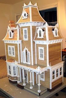 a large doll house sitting on top of a table