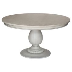 a white table with an oval top and pedestals on the base, against a white background