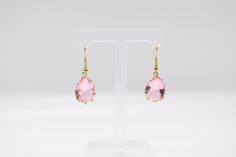 The Pink Stone Teardrop Earrings are graceful and charming accessories, featuring delicate teardrop-shaped pendants adorned with soft pink stone that exude elegance. These earrings effortlessly add a touch of femininity and sophistication to any outfit. Dangly Earrings Aesthetic, Earrings Aesthetic, Teardrop Pendant, Dangly Earrings, Pink Stone, Teardrop Earrings, The Pink, Jewelry Findings, Soft Pink