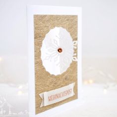 a close up of a card with a snowflake on it