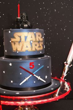 a star wars themed cake with lights on