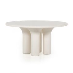 This Parra Dining Table - Plaster Molded Concrete is made from plaster-molded concrete with a cylindrical pillar-style base tapering slightly to support a smooth, white-finished tabletop. We love the texture and brightness this brings to any dining room or kitchen area.   Overall Dimensions: 59.75w x 59.75d x 30.00h Concrete Dining Table, Concrete Materials, Concrete Molds, Plaster Molds, Mcgee & Co, White Table Top, White Concrete, High Fashion Home, Four Hands