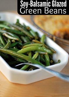 some green beans in a white bowl on a table