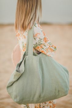 "Large linen beach bag available in various colors. Perfect for a long-awaited vacation, picnic, or trip to the beach. Beautifully made of soft heavyweight linen, with an extra linen lining inside. The bag is roomy enough to carry large towels along with other essentials. *Which is your favorite color? Tulip green / Natural / Camel / Charcoal gray - - - - - - - - - - - - - - - - - - - - - - - - - - DETAILS: * Made from 100% natural linen * Weight: 280 g/m² or 8.26 oz/yd² * Lining: 190 g/m² or 5. Oversized Beach Bags, Terracotta Linen, Perfect Beach Bag, Summer Blanket, Linen Summer, Oversized Bag, Oversized Tote Bag, Oversized Tote, Summer Bag