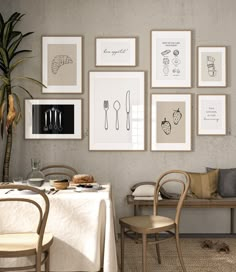 a dining room with pictures on the wall