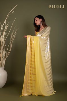 Party Sequin saree on Pure Georgette Party Wear Pre-draped Saree With Sheer Dupatta For Celebration, Pre-draped Saree With Mirror Work For Celebration, Diwali Party Pre-draped Tissue Silk Saree, Art Silk Pre-draped Saree With Sheer Dupatta, Traditional Drape Saree With Mirror Work, Yellow Bollywood Sharara With Sequins, Bollywood Style Yellow Sharara With Sequins, Pre-draped Saree With Dupatta For Navratri Party, Pre-draped Sequin Saree For Reception