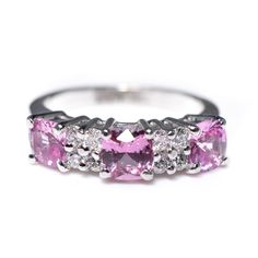 14kt White Gold Pink Sapphire & Diamond Ring Elegant Multi-stone Pink Sapphire Diamond Ring, Luxury Pink Sterling Silver Rings, Classic Pink Cluster Ring With Prong Setting, Luxury Pink Sapphire Ring Jewelry, Pink 14k White Gold Jewelry With Center Stone, Exquisite Pink Sapphire Ring, Luxury Pink Sapphire Jewelry For Anniversary, Pink Platinum Jewelry With Brilliant Cut, Pink Brilliant Cut Platinum Jewelry