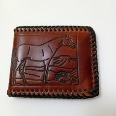 Never Used 5" X 4" When Folded Embossed Brown Wallets As Gift, Leather Wallet With Engraved Logo For Everyday Use, Brown Wallet With Engraved Logo For Everyday Use, Leather Trifold Wallet With Engraved Logo For Everyday Use, Leather Wallets With Engraved Logo For Everyday Use, Brown Wallets With Engraved Logo For Everyday Use, Hand Tooled Leather Wallet, Brown Embossed Wallet For Everyday Use, Hand Tooled Leather Trifold Wallet As Gift