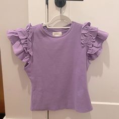 Never Worn, Brand New, Anthropologie Purple Ruffle Shirt, Size M Purple Short Sleeve Top For Brunch, Spring T-shirt With Ruffle Sleeves And Details, Chic Fitted T-shirt With Ruffles, Purple Flutter Sleeve Tops, Crew Neck Blouse With Ruffles For Brunch, Purple Ruffle Sleeve Tops For Summer, Purple Ruffle Sleeve Summer Tops, Chic Purple Cotton Top, Chic Ruffled T-shirt For Spring