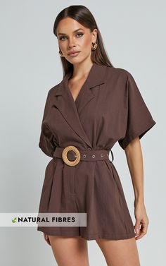 Get ready to turn heads this autumn in our Thaisa Playsuit! This short sleeve collared belted playsuit in choc is perfect for all your casual weekend activities. Made from a blend of linen and cotton, the A-line silhouette flatters every body shape while keeping you comfortable. The playful collar adds a touch of sophistication, making it ideal for both day and night outings. Pair it with some ankle boots and statement earrings, and you'll be effortlessly chic wherever you go!Product Details:A-l Weekend Activities, Short Playsuit, Casual Weekend, Autumn Season, Fabric Collars, Day And Night, Body Shape, Playsuit, Body Shapes