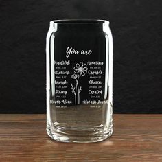 a glass jar with the words you are on it