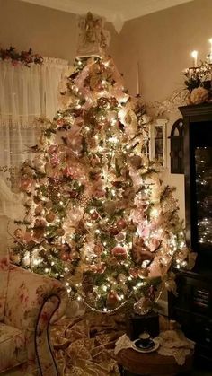 a decorated christmas tree in a living room