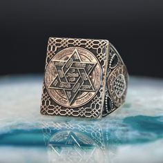 Solomon's Seal Ring, Handmade Sterling Silver Ring, Vintage Men Ring, Solomon Seal Silver Ring, Star of David Ring, Modern Men Ring ✦ Details ✦ * Material: 925 Sterling Silver * Weight:17,00 grams * Sides oxidized * Stamp: 925 * Available sizes; 5 US to 16 US. Contact me if you need any other size! ✦ Shipping ✦ * Processing time: 1-3 business days. * This item ships from my Turkish workshop in Istanbul. * Add your phone number in address box for a smoother delivery. That makes courier personnel' Solomon Seal, David Ring, Solomons Seal, Modern Men, Seal Ring, Handmade Sterling Silver Rings, Men Ring, Luxury Gift Box, Star Of David