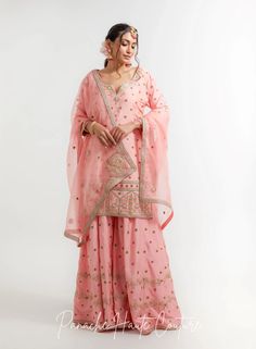 Peach Color Wedding Sharara Set Falak – Panache Haute Couture Pink Palazzo Set With Dori Work For Wedding, Pink Raw Silk Palazzo Set For Reception, Pink Raw Silk Palazzo Set With Chikankari Embroidery, Pink Dola Silk Palazzo Set For Diwali, Pink Sharara With Straight Kurta For Reception, Pink Straight Kurta Sharara For Reception, Pink Dola Silk Palazzo Set With Resham Embroidery, Wedding Straight Kurta Sharara In Dola Silk, Wedding Sharara With Straight Kurta In Dola Silk