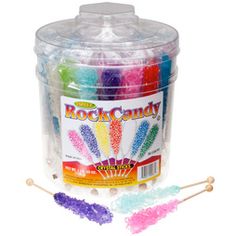 a bucket filled with lots of different colored candies