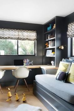 a living room filled with furniture next to a window covered in windowsills and curtains