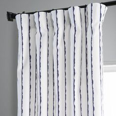 a curtain with blue and white stripes on it