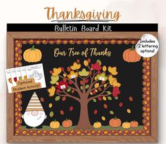 a bulletin board with an image of a tree and pumpkins