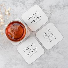 three coasters that say, ollivia henry and oleella henry on them