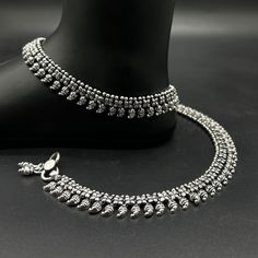 Name of product:  925 Sterling Silver Light Weight Anklet / Silver Payal Weight: 66.50 grams. Length: 26.5centimeter  Stamped: 925 FREE EXPRESS SHIPPING -----Feedback::- A satisfied customer is our top priority and your feedback forms the backbone of our success. Don't forget to give positive feedback along with good ratings. Thank You Silver Anklets With Latkans For Wedding, Silver Wedding Anklets With Latkans, Festive Silver Sterling Silver Anklets, Oxidized Metal Anklets, Elegant Adjustable Anklets For Festivals, Silver Latkans Jewelry For Formal Occasions, Formal Silver Jewelry With Latkans, Silver Bracelet With Latkans In Metal, Silver Anklets For Festivals