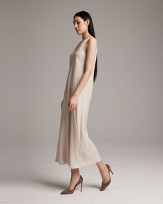 Make an effortless statement with our soft linen maxi dress. The lightweight linen blend makes this the perfect piece for a relaxed warm-weather look. Pair with the Linen Featherlight Blouse or Loose Knit Linen Sweater. 55% Linen, 45% Rayon Hand wash and Lay Flat to Dry or Dry Clean Model is 5'9" Chic Beige Maxi Dress For Loungewear, Casual Linen Maxi Dress For Loungewear, Chic Neutral Dress For Loungewear, Elegant Neutral Linen Midi Dress, Linen Midi Dress For Loungewear, Chic Neutral Linen Midi Dress, Elegant Flax Colored Linen Day Dress, Elegant Flax Linen Dress, Chic Neutral Linen Maxi Dress