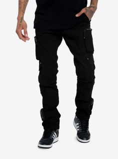 Add more black to your wardrobe with these fitted pants! Featuring cargo and zipper cargo pockets down the legs  plus a skull charm.97% cotton; 3% spandexWash cold; dry lowRise: 11''Inseam: 33 12''Leg: 6 12''ImportedListed in men'sunisex sizesModel is 6'1''Model wears size Medium Fitted Black Cargo Pants With Zip Fly, Techwear Cargo Pants With Zipper For Streetwear, Edgy Cotton Cargo Pants With Side Pockets, Edgy Cotton Pants With Multiple Pockets, Alternative Style Black Pants With Zip Fly, Black Stretch Cotton Cargo Jeans, Black Cotton Cargo Pants With Zip Fly, Urban Black Cargo Pants With Zipper Closure, Black Urban Cargo Pants With Zipper Closure