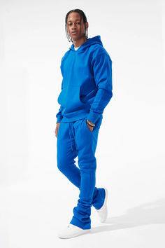 Street-ready comfort meets timeless style in the Uptown Pullover Hoodie. Hooded Fleece Tracksuit With Kangaroo Pocket, Solid Cotton Tracksuit With Pockets, Fleece Tracksuit With Hoodie And Pockets, Fleece Hoodie Tracksuit With Pockets, Fleece Tracksuit With Kangaroo Pocket, Blue Athleisure Sweats With Kangaroo Pocket, Cotton Hoodie Sweats With Side Pockets, Blue Sweats With Kangaroo Pocket For Loungewear, Fleece Tracksuit With Kangaroo Pocket In Athleisure Style