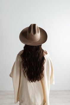 Ezra blends statement fashion with Western. A classic cattleman crown made to be styled for the city as much as the countryside. This hat features an upturned brim + a tall crown, giving Ezra a modern + feminine feel. Ezra comes with a removable tonal grosgrain band featuring a brass Gigi Pip pin. Other bands pictured are sold separately. Tall Crown, Wide Brim Felt Hat, Gigi Pip, Tan Hat, Western Vibes, Western Hat, Statement Fashion, Wide Brim Fedora, Modern Feminine