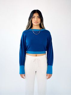 there’s no more need to borrow from the boys - our cropped crewneck sweatshirt gives you the oversize look while still complimenting the female frame. The pleating at the wrists and thick ribbing at the neckline, wrists, and hem highlight the contrasting proportion. Cropped Crewneck, The Boys, Dolman Sleeve, School Outfits, Sweater Vest, Bra Sizes, No More, The Borrowers, Crewneck Sweatshirt