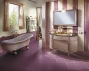 a bath room with a tub a sink and a mirror on the wall next to a window