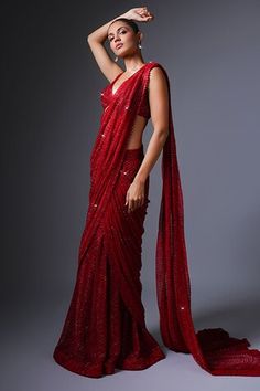 Red lehenga saree with crystal, bugle bead, thread embroidery in geometric pattern. Paired with cutwork embroidered blouse. - Aza Fashions Festive Draped Lehenga For Wedding, Festive Wedding Lehenga With Draped Shape, Festive Wedding Draped Lehenga, Red Draped Georgette Saree, Red Pre-draped Saree With Unstitched Blouse For Reception, Red Pre-draped Saree With Cutdana For Celebrations, Red Pre-draped Saree With Dupatta For Reception, Evening Gown With Pallu In Traditional Drape, Bollywood Style Red Pre-draped Saree For Reception