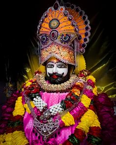 a man dressed in an elaborately decorated costume