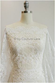 Very beautiful embroidered lace fabric for unique bridal dresses like used for example in Willowby Designs. Color: Off-white Yarn: Cotton Sequins: Yes Base: Nylon Mesh ❀❀ SAMPLE SWATCH ❀❀ If you want to check the color and quality, you can order a swatch here (READ DESCRIPTION OF THE LISTING  https://www.etsy.com/listing/733242442/sample-swatch-please-read-description?ga_search_query=sample&ref=shop_items_search_1&crt=1 Please note, that it can happen, that till you get your lace sample with air Fitted White Embroidered Fabric With Lace Trim, White Embroidered Fitted Fabric With Lace Trim, White Embroidered Fabric With Lace Trim, Fitted Cream Lace Embroidered Fabric, Fitted Cream Embroidered Lace Fabric, White Crochet Lace For Ceremony, White Crochet Lace For Ceremonies, White Scalloped Lace Embroidered Fabric, White Crochet Lace Wedding Dress