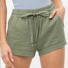 Light Olive Linen Blend Low Rise Wide Leg Smocked Pants Waist Tie Pocket Shorts 55% Linen, 45% Vicose Casual Bottoms With Banded Waist For Beach, Casual Beach Bottoms With Banded Waist, Summer Bottoms With Elastic Waistband In Khaki, Spring Khaki Shorts With Elastic Waistband, Casual Shorts With Banded Waist For Spring, Drawstring Waist Shorts, Pocket Shorts, Drawstring Shorts, Pair Of Pants