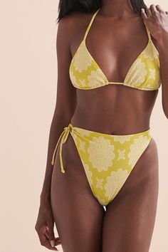 Floral print Triangle cups Straps can be adjusted in neck and back Removable padding High waist fit Knotted on one side Cheeky coverage Printed Fitted Swimwear With Tie-side Bottom, Printed Fitted Tie-side Bottom Swimwear, Printed Fitted Tie-side Swimwear, Printed Triangle Top Swimwear, Yellow Triangle Top Swimwear With Padded Cups, Yoga Set, Ribbed Fabric, Yellow Floral, Fitness Models