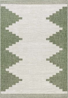 an area rug with green and white designs