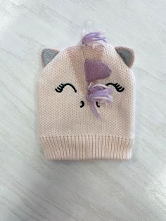 Introduce your little one to a world of magic with our Unicorn Hat for toddler girls. Made with high-quality material, this hat is perfect for keeping your child warm and stylish. Let their imagination run wild as they explore the magical world of unicorns with our adorable and comfortable hat. Unicorn Hat, Little One, Toddler Girl, How To Introduce Yourself, Hats