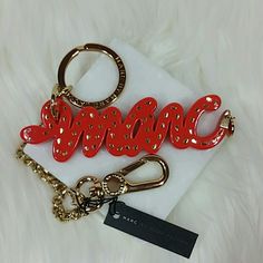 Very Cute Snake Script Bag Charm From Marc By Marc Jacobs. Perfect For Gift! Logo Detail, Clasp Closure. Metal, Plastic, Crystals. Color: Spiced Orange With Gold Metal. Xxviii Approximate Length 11". Brand New With Tag. Never Worn. Can Provide More Pictures And Info Upon Request. Price Is Negotiable Within Reason. Make An Offer! Designer Orange Bags As Gifts, Designer Orange Bags For Gifts, Marc Jacobs Perfect, Gift Logo, Cute Snake, Orange Spice, Orange Gold, Marc By Marc Jacobs, Marc Jacobs