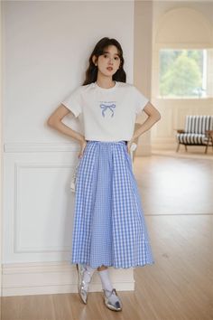 Double gingham plaid skirt with a button-up closure and scalloped hem. S: 24" waist, 30.5" lengthM: 25.5" waist, 31" lengthL: 27" waist, 31.5" length Spring Gingham Skirt In Preppy Style, Spring Gingham Cotton Skirt, Preppy Gingham Skirt For Spring, Spring Gingham Skirt For Day Out, Gingham Skirt For Day Out In Spring, Summer Preppy Plaid Skirt, Preppy Plaid Summer Skirt, Casual Houndstooth Skirt For Summer, Casual Gingham Pleated Skirt