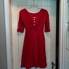 In Good Condition With Minimal Wear. No Stains. Bustline 34”, Waist 26”, Length 40” Red Fitted Tea-length Dress, Retro Red Lined Dress, Red 1950s Style A-line Vintage Dress, Fitted Red Dress With Buttons, Fitted Red Dresses With Buttons, Red Vintage Midi Dress, Red Fitted Midi Vintage Dress, Red Fitted Knee-length Vintage Dress, Red Fitted Vintage Midi Dress