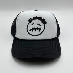 "travis scott cactus jack logo inspired trucker hat printed on a vintage fit trucker snapback cap you will receive: 1 white/black trucker cap (features black puff print) made in lot c. visit us for more music, movies and pop culture \"parking lot style\" custom merch! custom colors available upon request! please inquire beforehand to ensure availability. all orders take 1-2 business days to process and ship. all sales are final. no refunds or exchanges." Adjustable Hip Hop Trucker Hat For Streetwear, White Trucker Baseball Cap For Streetwear, Adjustable Trucker Hat For Streetwear, Streetwear Trucker Hat With Flat Bill, Trucker Dad Hat With Flat Bill For Streetwear, Trucker Style Snapback Baseball Cap For Streetwear, White Trucker Hat For Streetwear, Snapback Trucker Hat For Streetwear, Adjustable Halloween Hats For Streetwear