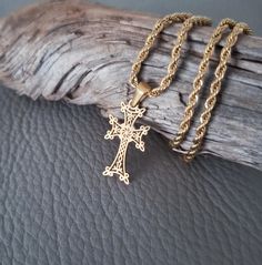 This is a handcrafted traditional Armenian cross (Khachkar) in 18k Gold Stainless Steel . This beautiful Dianty jewelry is designed with great details. It makes a perfect gift for an Armenia Women and your loved ones. The Khachkar cross is believed to possess holy powers and can provide help, protection, victory and long life.  Made od a quality waterproof Stainless steel. Pendant size is 3cm long. All our items are custom made, it takes 3-5 days to get your order prepared.  The delivery date will depend on your location.  * USA - 2 - 4 weeks * Canada - 2 - 5 weeks * Europe - 2-3 weeks * Other - 2 - 4 weeks Please read our frequently asked questions FAQ to find out more. Armenian Jewelry, Byzantine Cross Pendant Necklace For Gift, Armenian Cross, Armenian Necklace, Orthodox Cross Pendant, Gold Cross Necklace Mens Jewelry1000.com, Rope Chain, Cross Pendant, 18k Gold